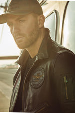 Patched and printed brown leather pilot jacket - Image n°4