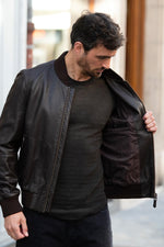 Brown leather bomber jacket with metal eagle on the chest - Image n°5