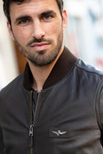 Brown leather bomber jacket with metal eagle on the chest - Image n°4