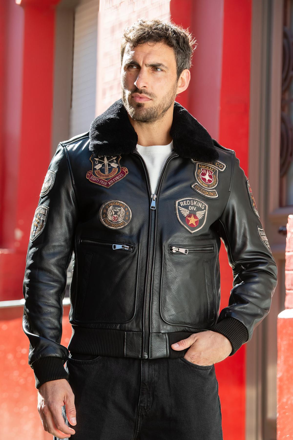 Black leather aviator jacket with patches - Image n°1
