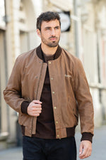 Elegant caramel-colored leather teddy jacket with embroidery - Image n°1