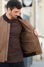 Elegant caramel-colored leather teddy jacket with embroidery - Image n°14