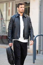 Navy blue leather jacket with a clean, shirt-collar design and removable facing - Image n°6