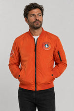 Orange bomber jacket with front badge and back embroidery - Image n°1