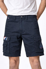Navy blue cotton patched Bermuda shorts - Image n°1