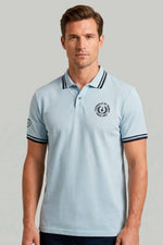Men's light blue polo shirt with logo - Image n°1
