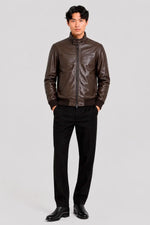 Brown leather jacket with a quilted lining - Image n°1