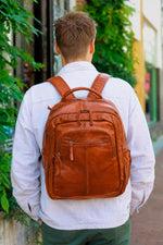Practical cognac leather backpack - Image n°1