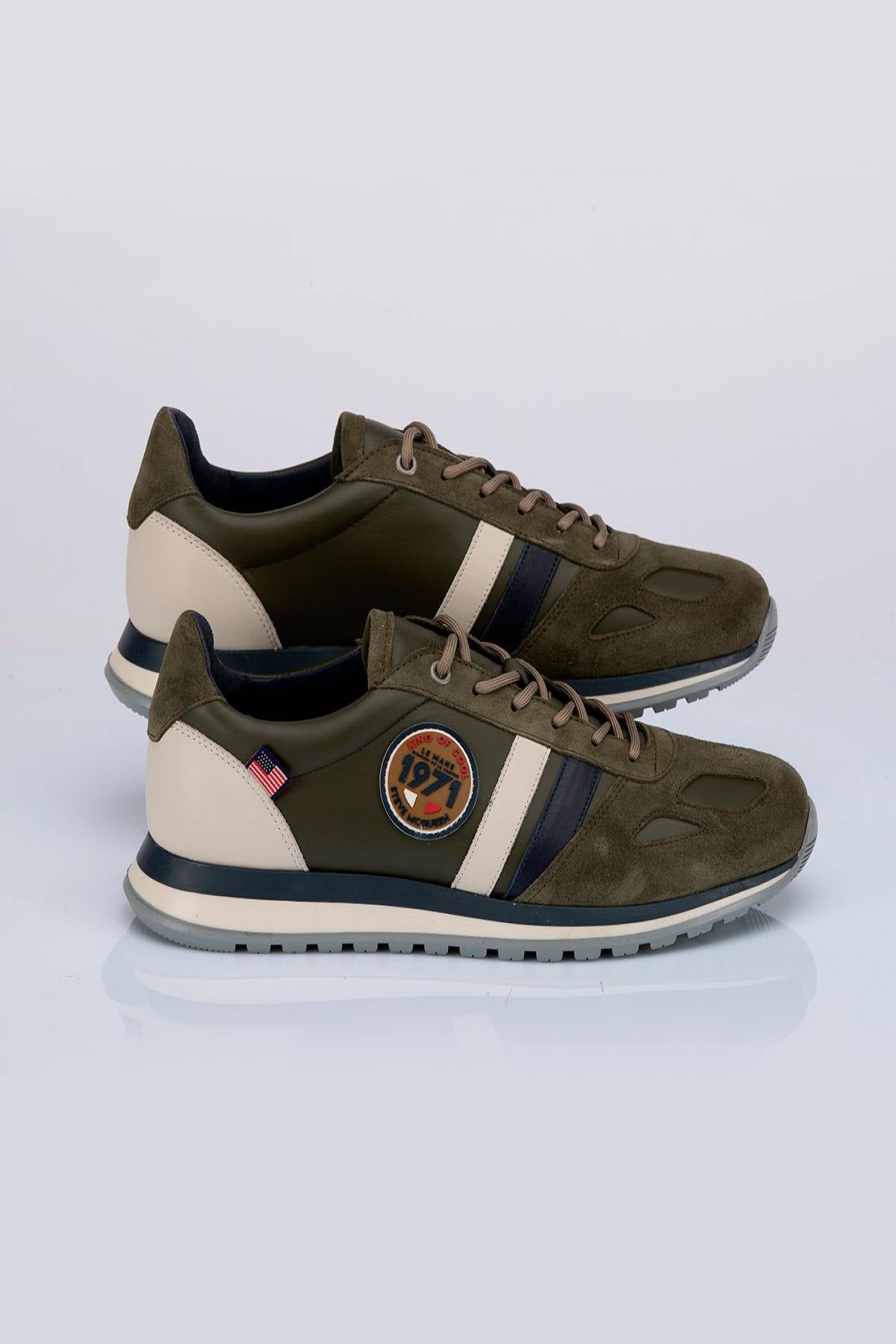 Men's green leather sneakers - Image n°1