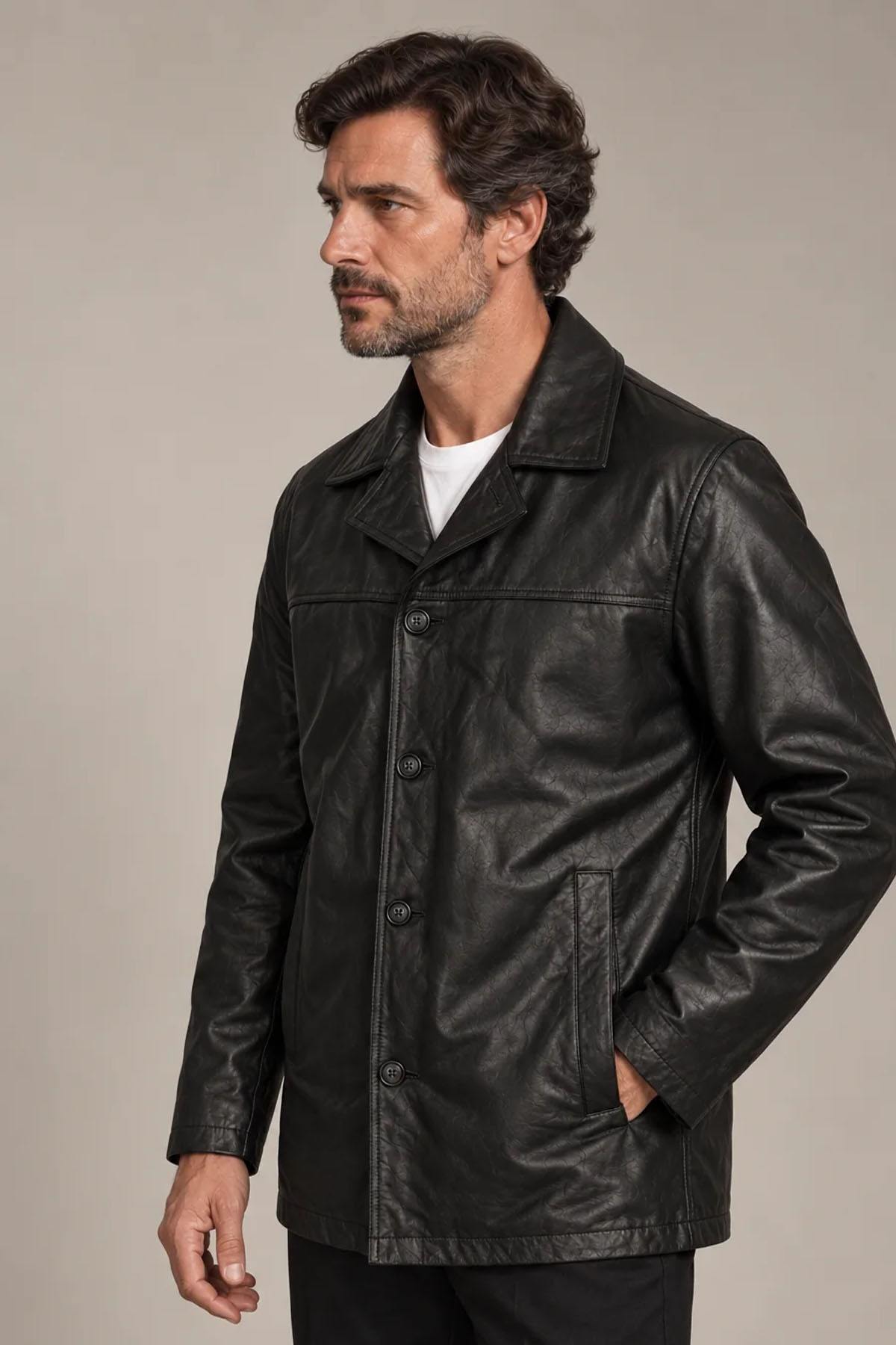Black buttoned mid-length leather jacket - Image n°1