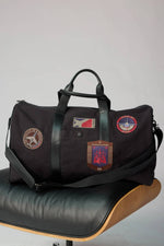 Travel bag in cotton canvas and black leather - Image n°2