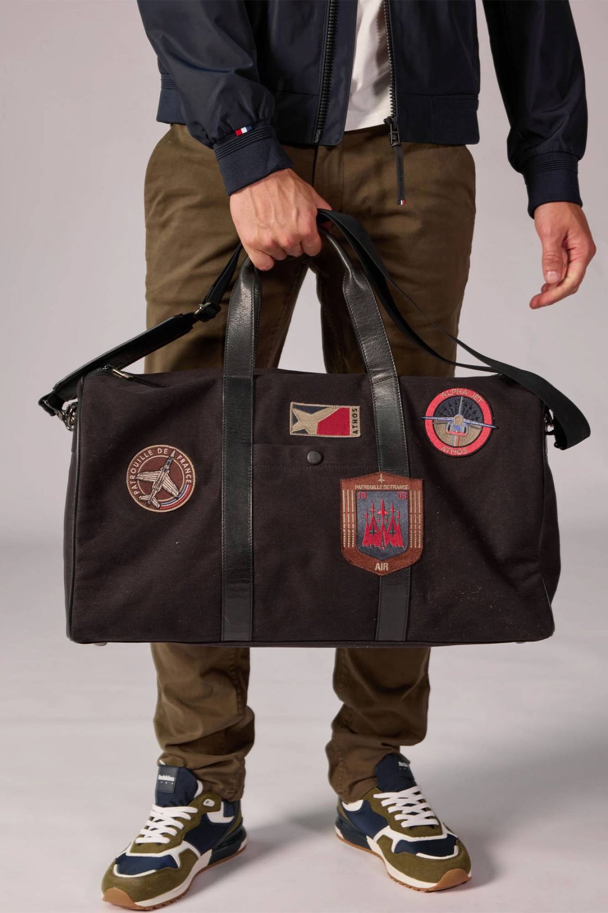 Travel bag in cotton canvas and black leather - Image n°1