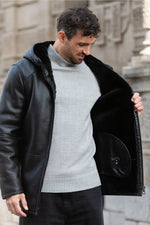 Black hooded long coat in shearling leather - Image n°5