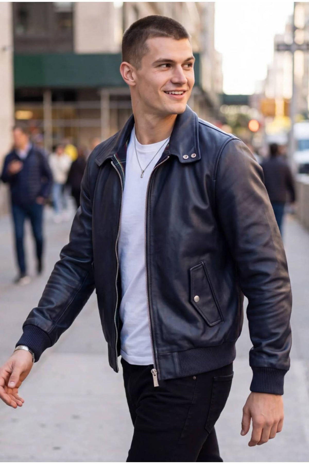 Iconic navy blue leather jacket with tartan lining - Image n°1