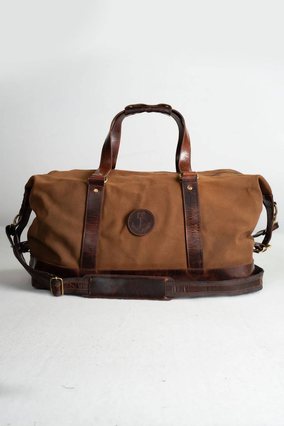 Characterful suede leather travel bag - Image n°1