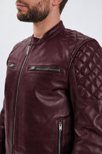 Burgundy leather motorcycle jacket. - Image n°2