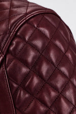 Burgundy leather motorcycle jacket. - Image n°6