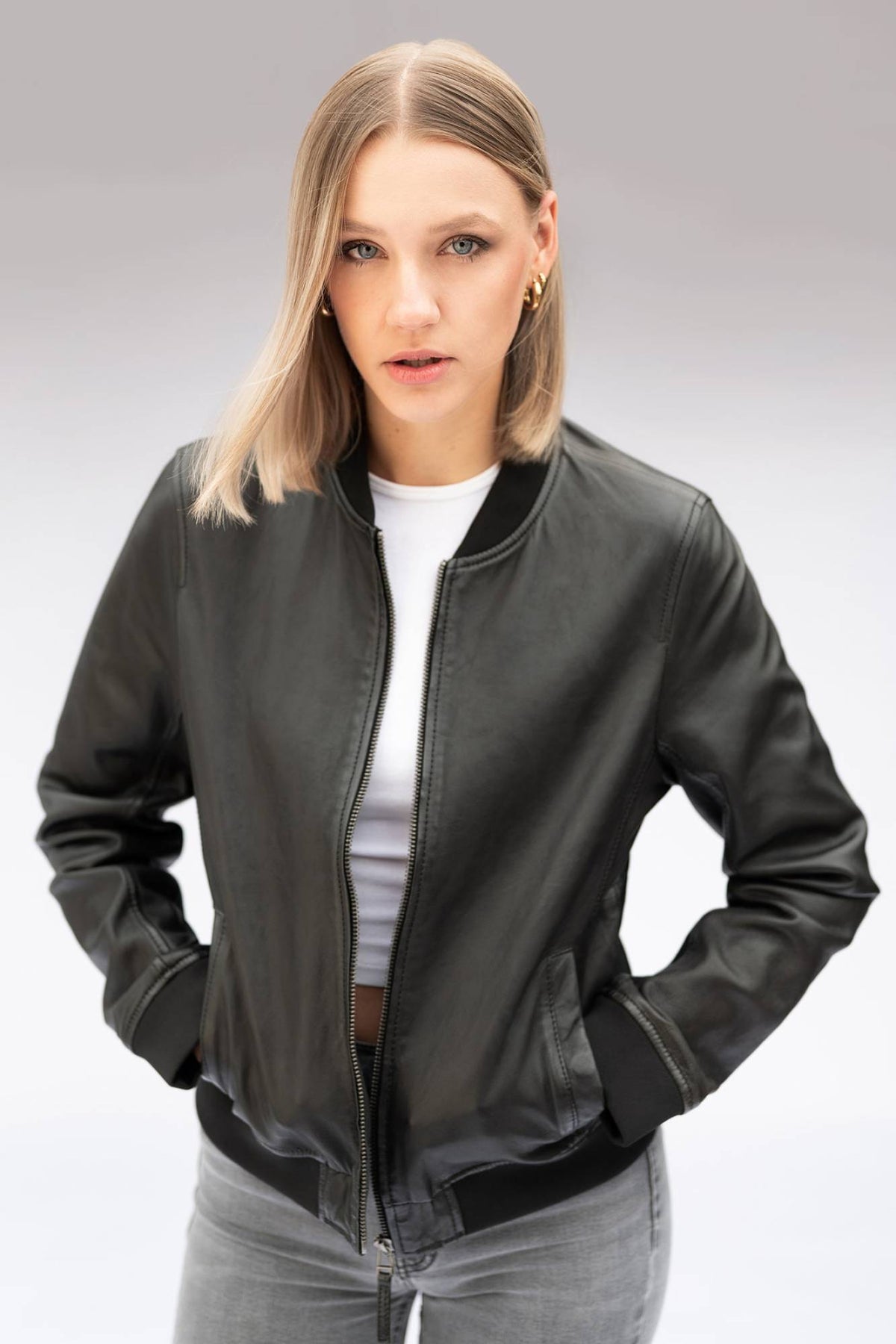 Women's black lambskin leather jacket with ribbed trims - Image n°1
