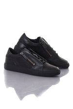 Low-top cracked leather sneakers - Image n°1