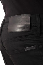 Men's black coated skinny fit jeans - Image n°6