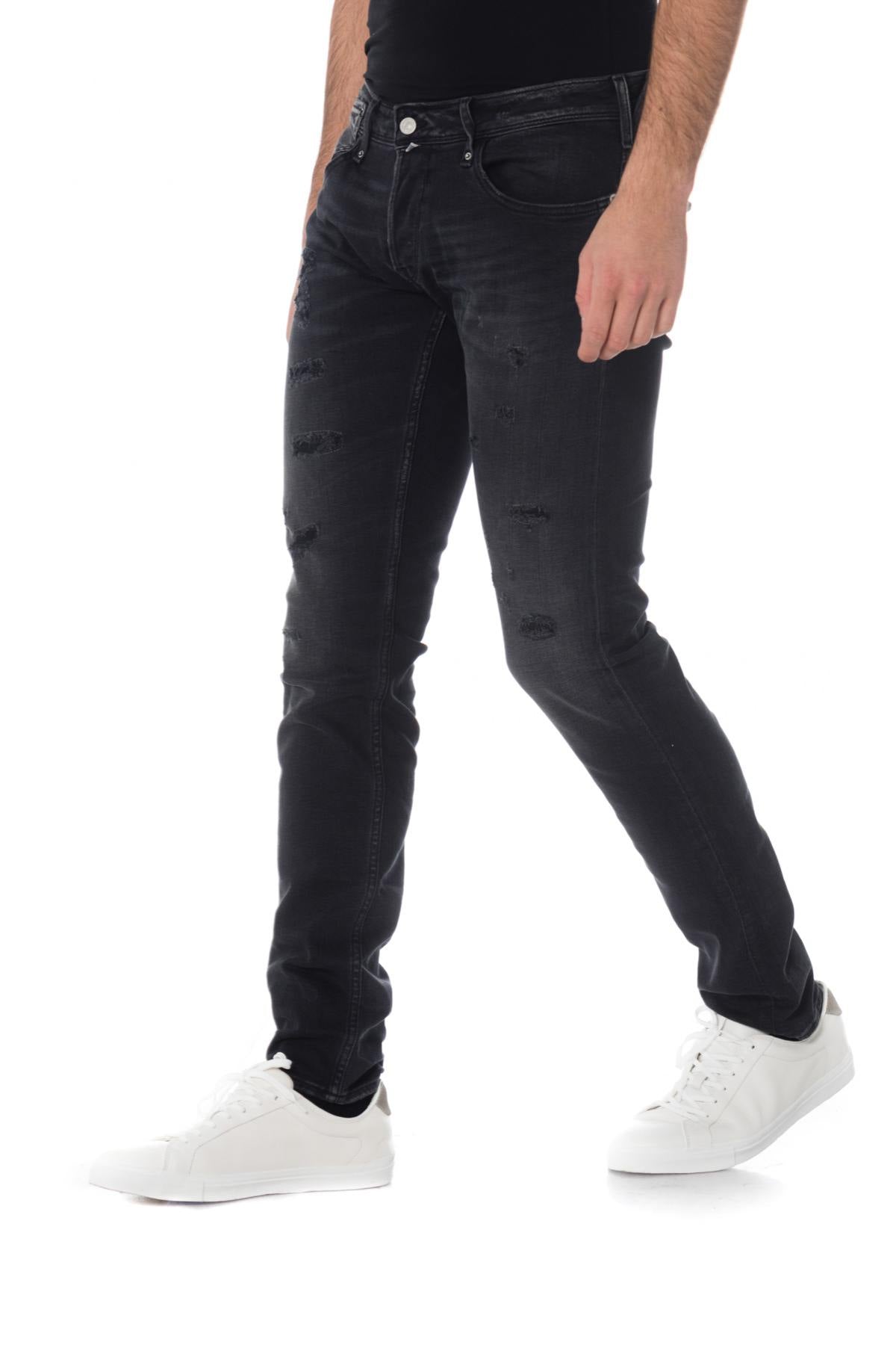Men's black destroyed jeans - Image n°1