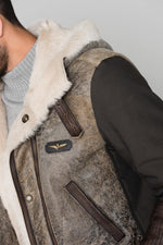 Sheepskin and textile parka - Image n°9