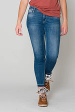 Blue jeans with 7/8 raw edge - Image n°1
