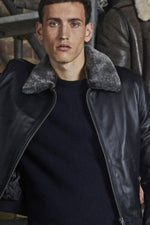 Black leather jacket with fur collar - Image n°11