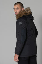 Hooded parka with faux fur - Image n°9