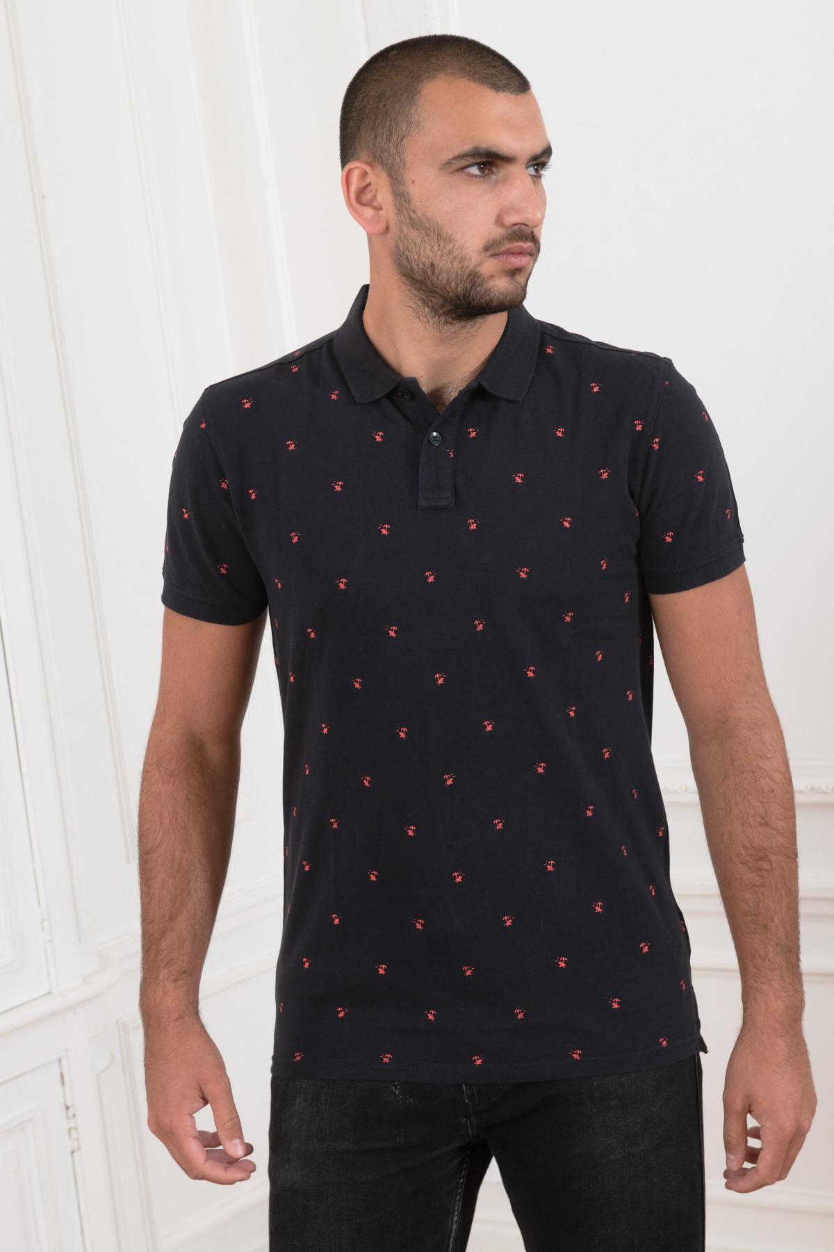 Men's navy blue polo shirt with red patterns - Image n°1