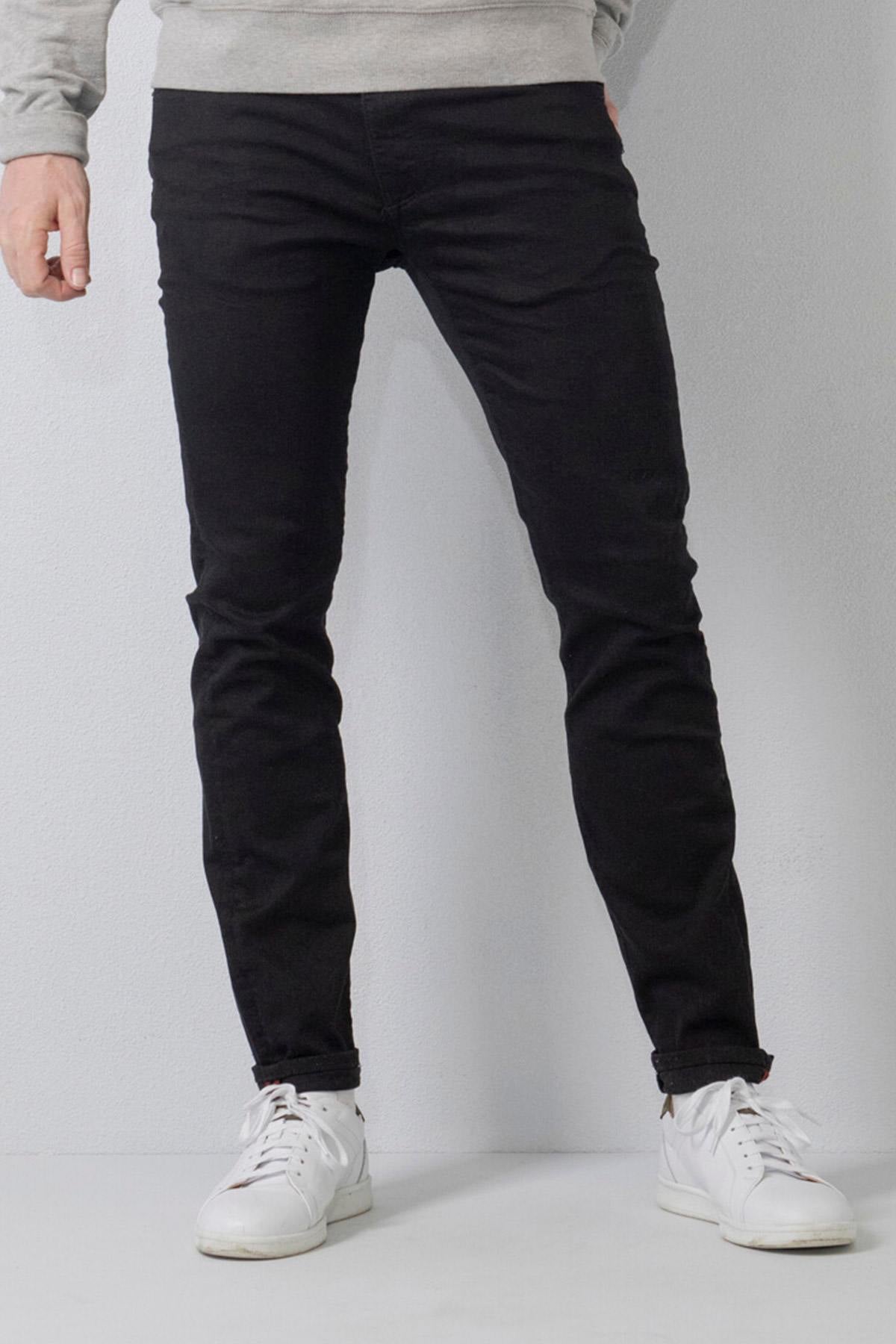 Men's black slim-fit jeans - Image n°1