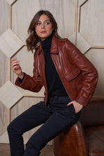 Women's pilot-inspired tan leather jacket - Image n°1