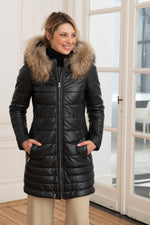 Long down jacket in very dark blue leather - Image n°1