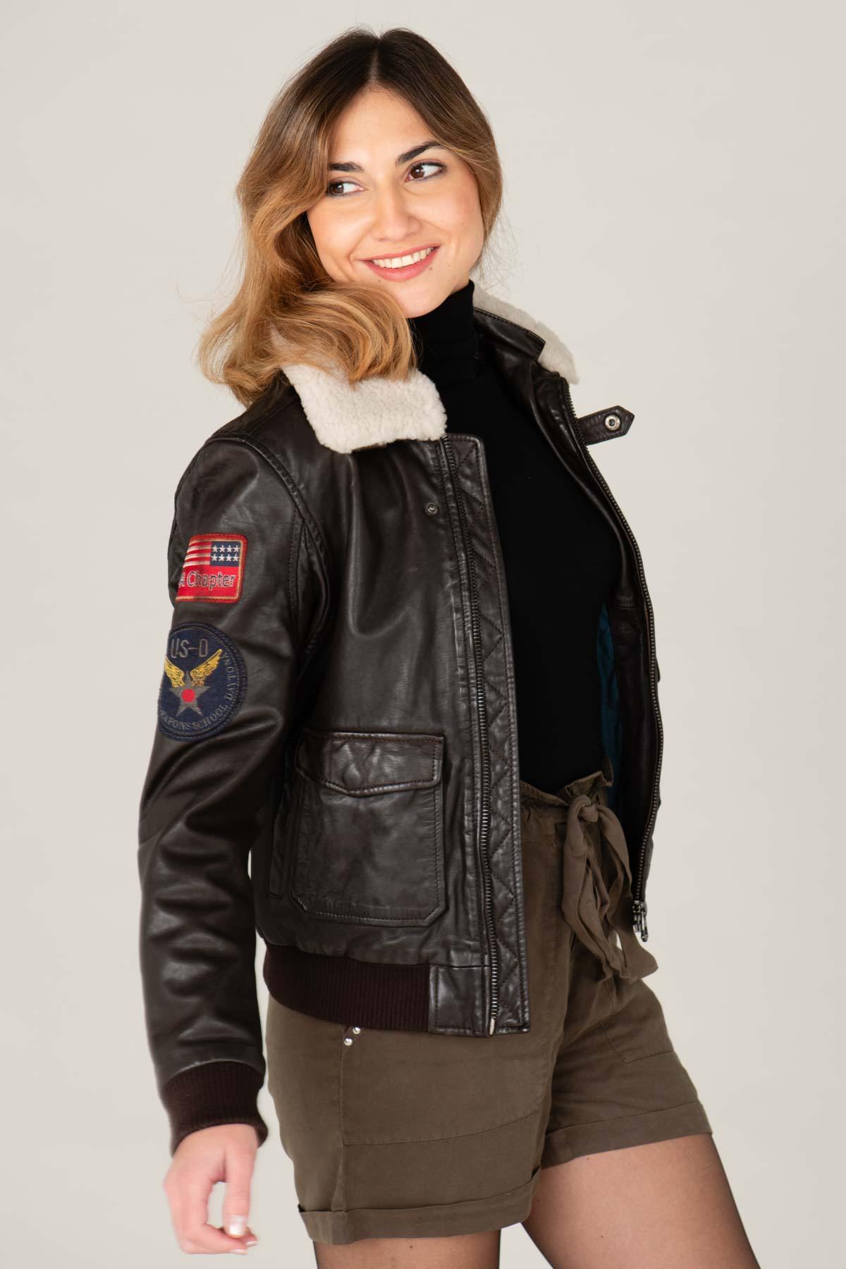 Women's leather bomber jacket with patches - Image n°1